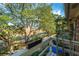 An outdoor porch with a view of trees and the marshlands in the distance at 607 Saint Charles Ct, Charleston, SC 29407