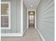Charming entryway with light blue walls and a stylish black front door at 429 Grove End Rd, Moncks Corner, SC 29461