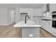 Modern kitchen featuring island with sink and stainless appliances at 429 Grove End Rd, Moncks Corner, SC 29461