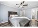 Cozy bedroom featuring a comfortable bed, soft pillows, ample natural light, and easy access to bathroom at 7930 Timbercreek Ln # C, North Charleston, SC 29418
