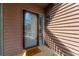 Charming front entrance features a glass door, a cute doormat, and stylish siding at 7930 Timbercreek Ln # C, North Charleston, SC 29418