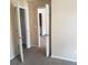 Bedroom view showcasing doorway and neutral walls at 7963 Weld St, North Charleston, SC 29418