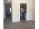 Inviting living room showcasing an open floor plan with an eat-in kitchen and neutral tones at 7963 Weld St, North Charleston, SC 29418