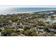 Aerial view of condo complex close to beach in lushly landscaped community at 8 Lagoon Villas, Isle of Palms, SC 29451