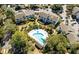 Aerial view of condo complex with pool and beautifully landscaped grounds at 8 Lagoon Villas, Isle of Palms, SC 29451