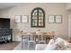 Open dining area boasts neutral walls, wooden table set, and a decorative wall mirror at 8 Lagoon Villas, Isle of Palms, SC 29451