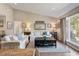 Spacious living room featuring vaulted ceilings and an abundance of natural light at 8 Lagoon Villas, Isle of Palms, SC 29451
