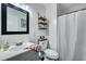 Practical bathroom featuring a vanity, mirror, toilet, and a shower with a white curtain at 87 Ashley Hall Plantation Rd # 108, Charleston, SC 29407