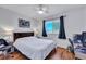 Bright bedroom with a ceiling fan, window with blinds, and an area for work or study at 87 Ashley Hall Plantation Rd # 108, Charleston, SC 29407