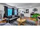 Cozy living room featuring modern decor, comfortable seating, and abundant natural light at 87 Ashley Hall Plantation Rd # 108, Charleston, SC 29407
