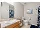 Bathroom featuring a single vanity, toilet, and framed art on the wall at 8816 Kellum Dr, North Charleston, SC 29420
