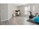 Bright office with a home gym with desk, treadmill and exercise ball at 8816 Kellum Dr, North Charleston, SC 29420