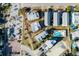 Bird's eye view of homes and swimming pools in a community with tree lined streets at 9 J C Long Blvd, Isle of Palms, SC 29451