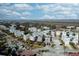 Overhead view of homes in a coastal community with a view of the waterway at 9 J C Long Blvd, Isle of Palms, SC 29451