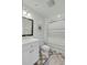 Classic bathroom featuring a vanity sink, tiled floors, and a shower with striped curtain at 9 J C Long Blvd, Isle of Palms, SC 29451
