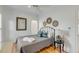 Relaxing bedroom featuring a ceiling fan, neutral decor, and comfortable bedding at 9 J C Long Blvd, Isle of Palms, SC 29451