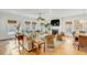 Bright living room with hardwood floors, fireplace, comfortable seating, and natural light streaming through the windows at 9 J C Long Blvd, Isle of Palms, SC 29451