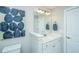 A clean bathroom featuring a toilet and a white vanity with great lighting at 103 Noisette Row, Summerville, SC 29483