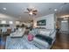 Spacious living room featuring an open floor plan and hardwood floors at 103 Noisette Row, Summerville, SC 29483