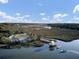 Scenic aerial view of a boat landing on the marsh, showcasing waterfront activities and natural beauty at 1042 Chambers Ln, Mount Pleasant, SC 29464