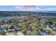 Aerial view of a neighborhood featuring tree-lined streets, waterways, and waterfront properties at 1042 Chambers Ln, Mount Pleasant, SC 29464