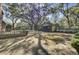 Backyard featuring a small shed and deck area with views of mature trees at 1042 Chambers Ln, Mount Pleasant, SC 29464