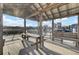 Covered seating area on a dock featuring wooden benches with water views at 1042 Chambers Ln, Mount Pleasant, SC 29464