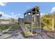 Playground featuring a slide, ladder, and swings with a dock house visible at 1042 Chambers Ln, Mount Pleasant, SC 29464