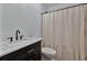 Bathroom featuring dark cabinets, marble counters, and a shower with a curtain at 105 Carter Dr, Goose Creek, SC 29445