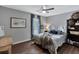 Comfortable bedroom with a ceiling fan, framed art, and plush bedding at 105 Carter Dr, Goose Creek, SC 29445