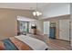 Spacious primary bedroom with vaulted ceiling, hard floors, and lots of room for storage and decor at 105 Carter Dr, Goose Creek, SC 29445