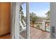 Balcony view overlooking a beautiful yard with a pool and marsh views in the distance at 1105 Fort Lamar Rd, James Island, SC 29412