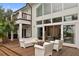 Home exterior with a view of the patio deck, pool and the open living space of the interior at 1105 Fort Lamar Rd, James Island, SC 29412