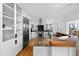 Bright, modern kitchen featuring granite countertops, stainless steel appliances, and a large island at 1105 Fort Lamar Rd, James Island, SC 29412