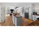 Spacious kitchen featuring a large island, stainless steel appliances, and hardwood floors at 1105 Fort Lamar Rd, James Island, SC 29412