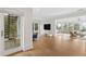 Open concept living area with hardwood floors and staircase leading to upper floor at 1105 Fort Lamar Rd, James Island, SC 29412
