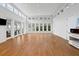 Bright and open living room with lots of windows and french doors with views to the outdoors at 1105 Fort Lamar Rd, James Island, SC 29412