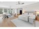 Large bedroom with sitting area, hardwood floors, and great natural light at 1105 Fort Lamar Rd, James Island, SC 29412