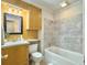 Bathroom featuring tiled shower/tub combo and wood vanity at 115 O'Carroll St, Moncks Corner, SC 29461