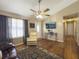 Cozy living room with a neutral decor, hardwood floors, and plenty of natural light at 115 O'Carroll St, Moncks Corner, SC 29461