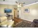 Spacious living room with a large window, hardwood floors, and ceiling fan at 115 O'Carroll St, Moncks Corner, SC 29461