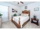 Bedroom with a ceiling fan, an antique bed frame and lots of natural light at 121 Lakelyn Rd, Moncks Corner, SC 29461