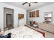 Bright bedroom has a ceiling fan and a sewing station with natural light at 121 Lakelyn Rd, Moncks Corner, SC 29461