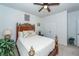 Bedroom with a large bed, ceiling fan, and double door closet at 121 Lakelyn Rd, Moncks Corner, SC 29461