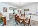 Comfortable dining space near the kitchen and living room with elegant decor at 121 Lakelyn Rd, Moncks Corner, SC 29461