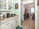 Kitchen area featuring granite countertops, white cabinets, and hardwood floors at 121 Lakelyn Rd, Moncks Corner, SC 29461