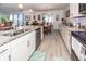 Kitchen with stainless steel appliances, granite counters, and a view into the dining room at 121 Lakelyn Rd, Moncks Corner, SC 29461