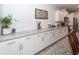 Bright kitchen features white cabinets, granite counters and stainless steel appliances at 121 Lakelyn Rd, Moncks Corner, SC 29461