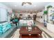 Bright and airy living room with access to an open kitchen and dining area at 121 Lakelyn Rd, Moncks Corner, SC 29461