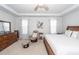 Comfortable primary bedroom featuring a ceiling fan, a dresser, and natural light from the windows at 121 Lakelyn Rd, Moncks Corner, SC 29461